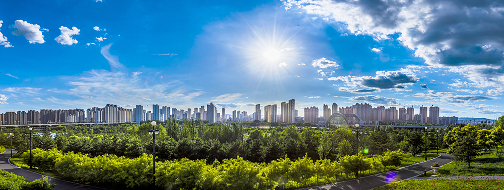 A district heating system with Co-generation based on absorption heat-exchange in Datong